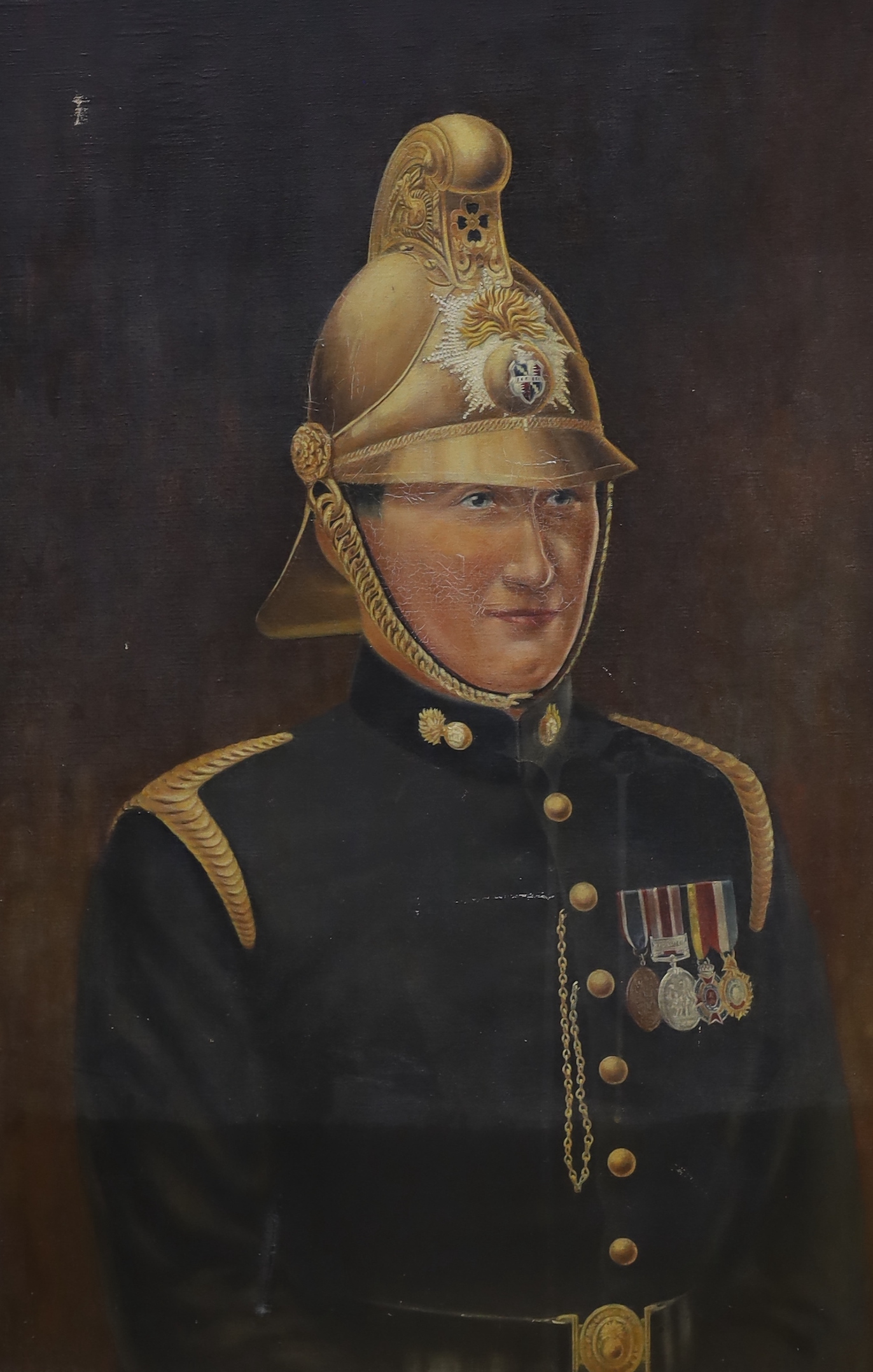 English School c.1900, oil on canvas, Portrait of a French fireman, 91 x 60cm